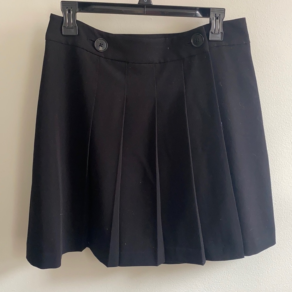 Black Pleated Tommy skirt.